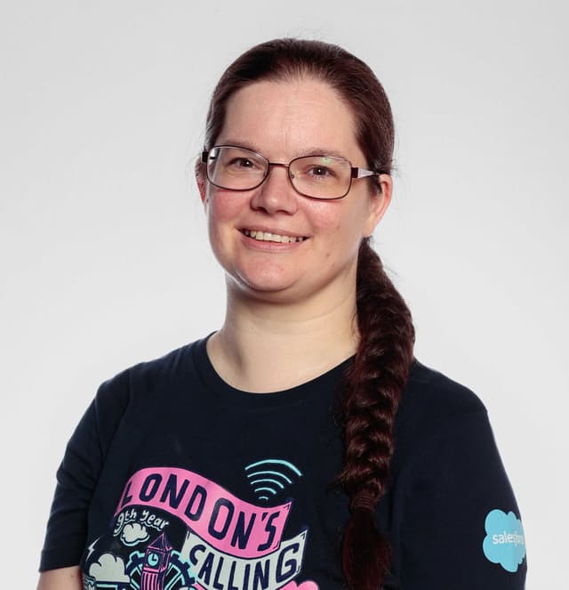Brown hair woman with glasses
